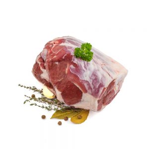 Raw lamb leg with bone, spices